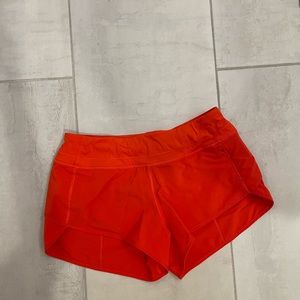 CRZ YOGA Women's Running Shorts Low Waisted 2.5 in the color red